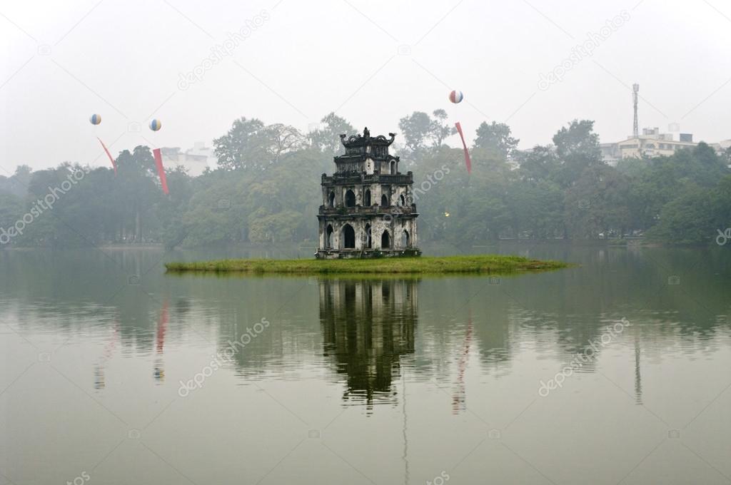 Tortoise Tower is on an island in Hoan Kiem Lake. Hanoi, Vietnam
