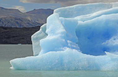 Iceberg in lake Argentino near Upsala glacier. clipart