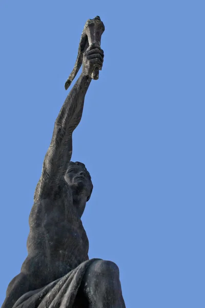 Triumph. Statue of a man with a torch — Stock Photo, Image