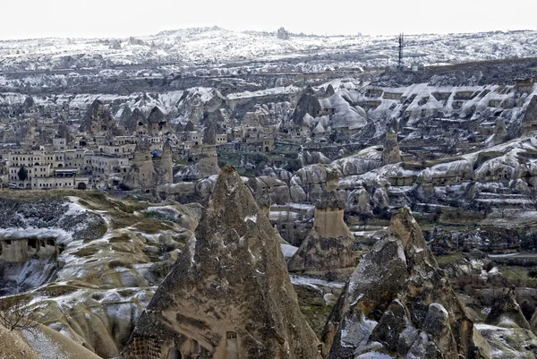 Sandstone formations in town Goreme. Cappadocia, Turkey. — Stock Photo, Image
