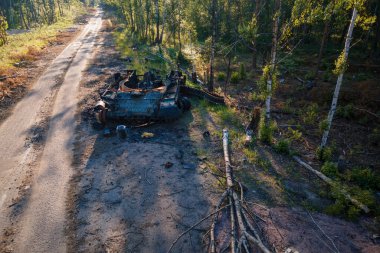 The war in Ukraine, Destroyed and burned russian battle tank of the Russian invaders in Ukraine 2022, Kiev region