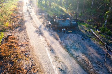 The war in Ukraine, Destroyed and burned russian battle tank of the Russian invaders in Ukraine 2022, Kiev region