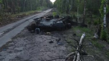 War in Ukraine, Remains of Destroyed and burned by Ukrainian troops Russian battle tank of the Russian invaders in Ukraine 2022, Kiev region. Destruction and escalation concept