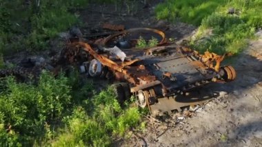 War in Ukraine, Remains of Destroyed and burned by Ukrainian troops Russian battle tank of the Russian invaders in Ukraine 2022, Kiev region. Destruction and escalation concept