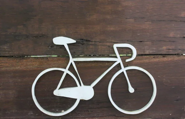 Bicycle sign on wood — Stock Photo, Image