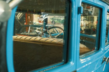 Classic car close up, interior through glass. Old vintage retro car. Classic cars of the 20th century