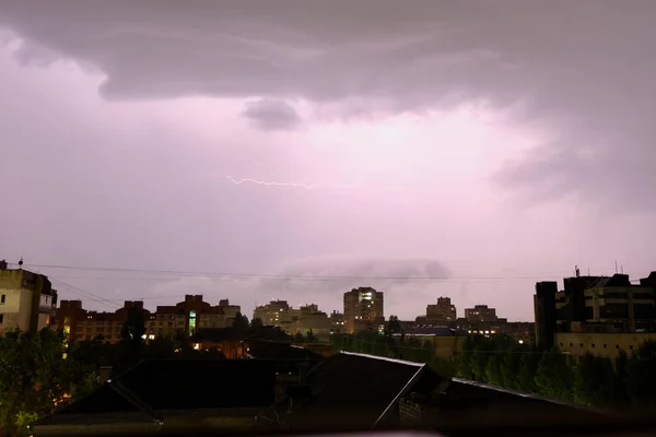 Lightning in the sky at night. Lightning during a thunderstorm in the night sky