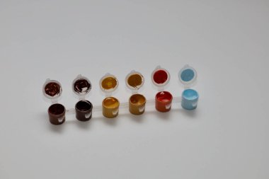 A set of multi-colored paints. Acrylic, gouache, watercolor, oil - paints for the artist. A set of paints of various colors for drawing with a brush