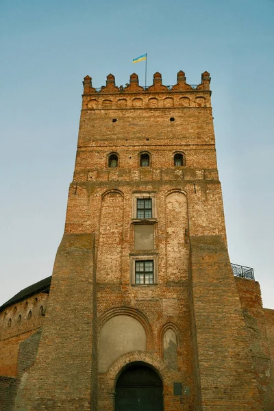 Walls and tower of an ancient castle. Brick walls and watchtower of an ancient castle. History - ancient Ukrainian castle