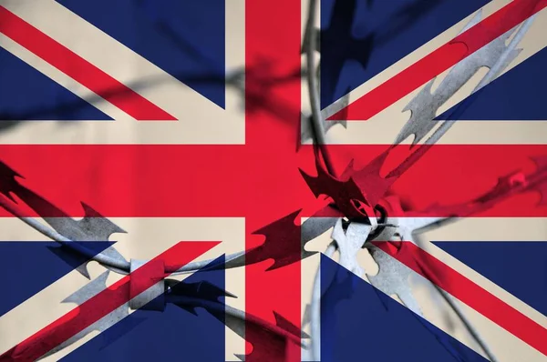 Absztrakt Kép Nagy Britannia Nemzeti Zászlójáról Csavart Szögesdróttal Elnyomás — Stock Fotó