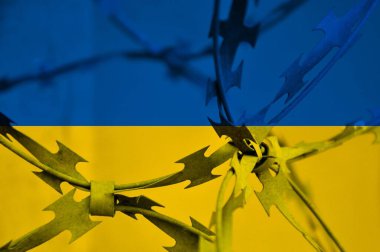Abstract image of the national flag of Ukraine with twisted barbed wire. Repression. clipart