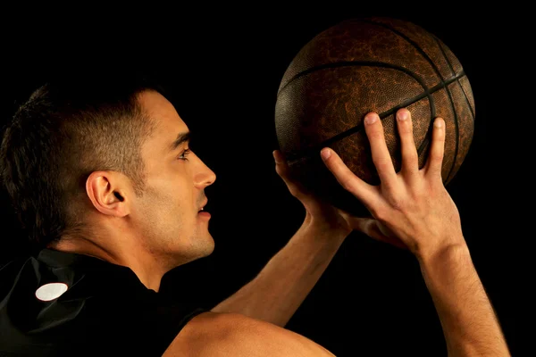 Basketball player holding ball — Stock Photo, Image
