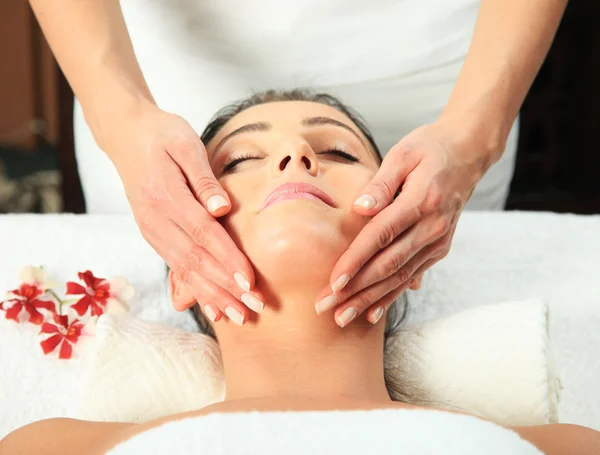 Young woman receiving massage — Stock Photo, Image