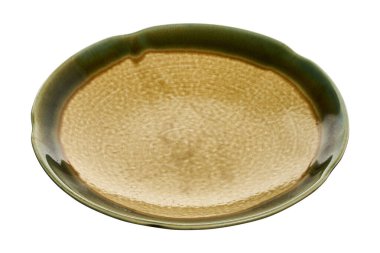 Vintage ceramic plate, Empty plate with green edge, isolated on white background with clipping path, Side view                       