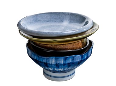 Stacked ceramic plates and bowls, Empty ceramics plates and bowls isolated on white background with clipping path, Side view