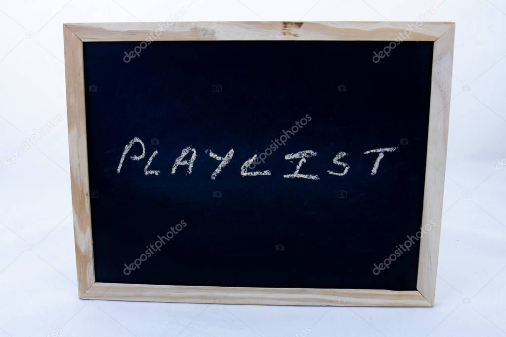 The term playlist written on a blackboard