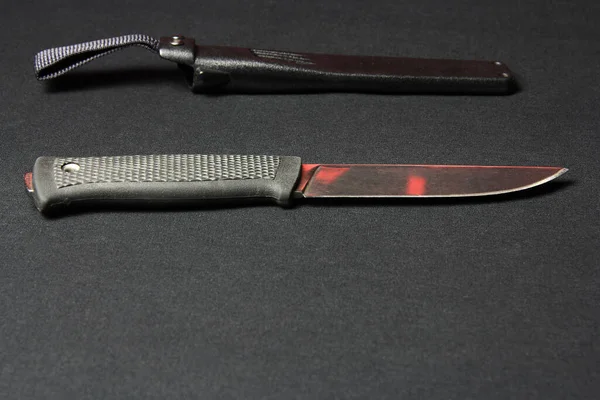 Self defense tactical knife on the table