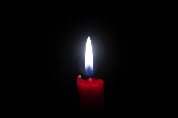 Światło Świecy Pali Się Czarnym Tle Religia — Zdjęcie stockowe