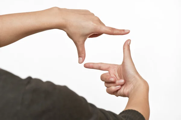 Φωτογραφία σημάδι από ανθρώπινα χέρια σε άσπρο φόντο — Φωτογραφία Αρχείου