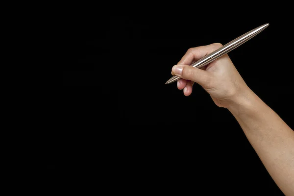 Vrouwelijke hand is klaar voor tekening met zwarte marker. geïsoleerd. — Stockfoto
