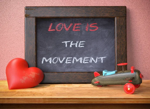 Tablă Text Dragostea Este Mișcarea Plasată Masa — Fotografie, imagine de stoc