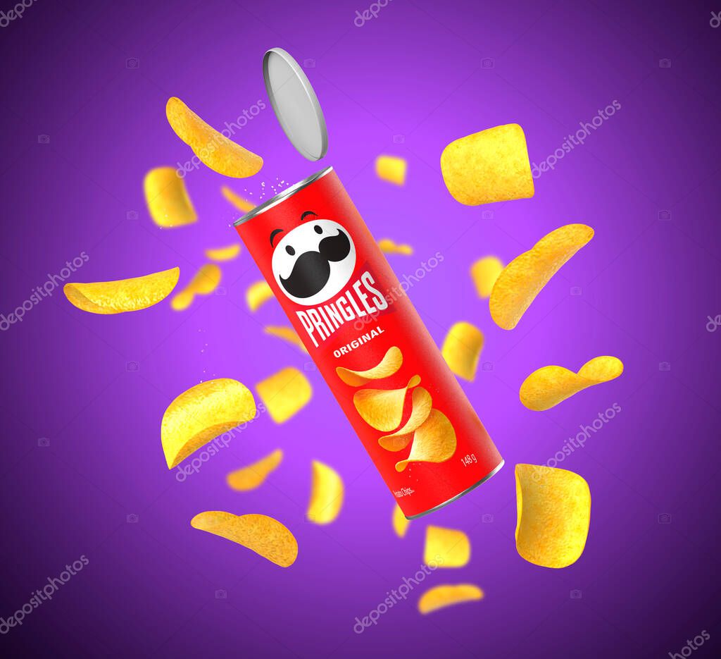 Malaga, Spain - September 24, 2022 Pringles potato chips package on purple background