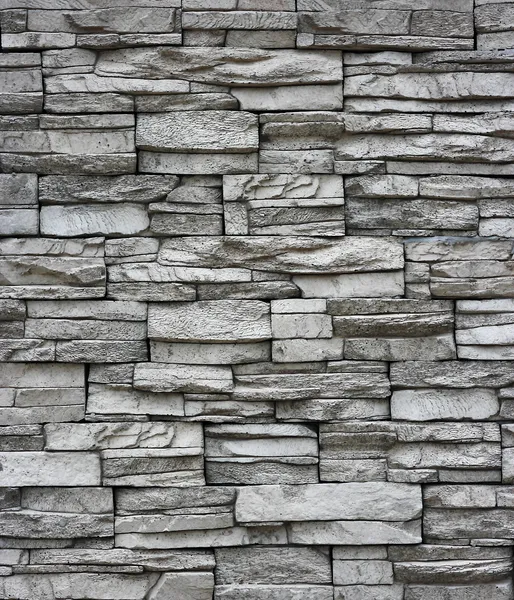 Szara ceglana ściana. Ściana murowana jako tło. — Zdjęcie stockowe