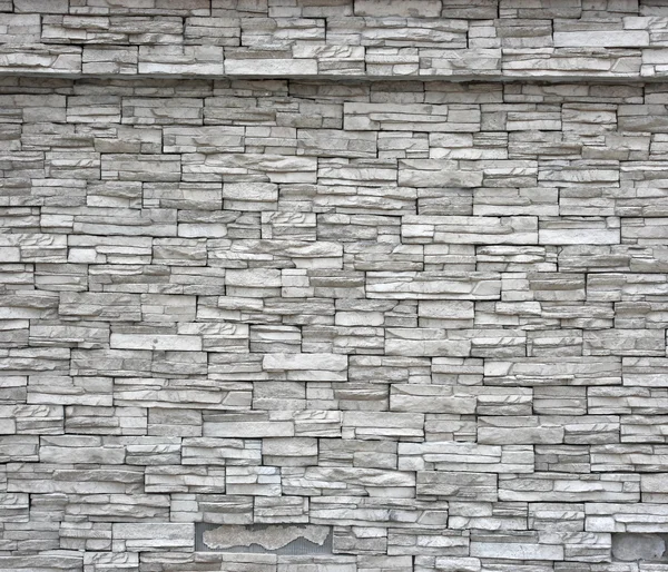Weaterhead dekorativa vägg. tegelvägg som bakgrund. — Stockfoto