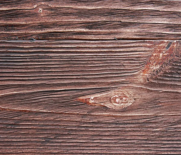 Wooden plank closeup. Weathered texture with the branch. — Stock Photo, Image