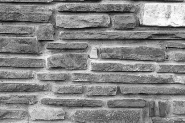 Different stones in a row. Ancient wall. — Stock Photo, Image