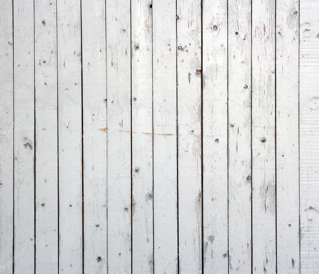 White background of weathered painted wooden plank. Wooden plank