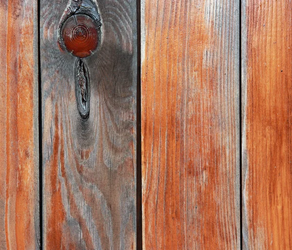 Zblízka rustikální plot z dřevěných prken. — Stock fotografie