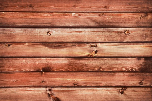 Wooden background. Simple wooden planks with a branches.