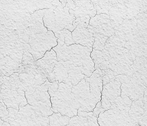 Texture d'un mur de ciment gris avec des fissures. Mur en béton gris . — Photo