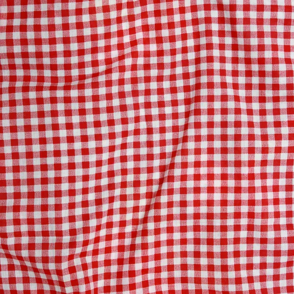 Red and white checkered picnic blanke — Stock Photo, Image