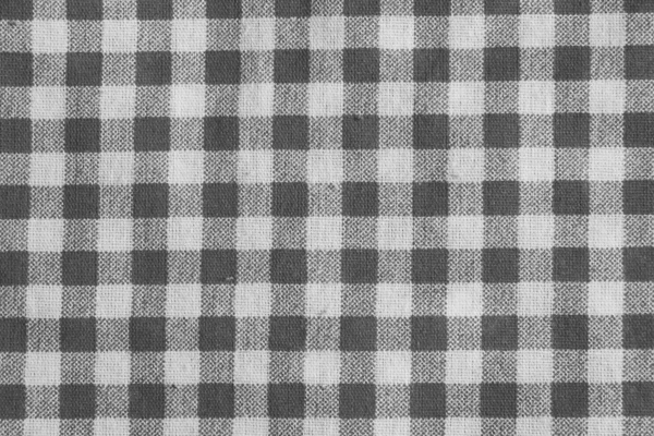 Texture of a black and white checkered picnic blanket. — Stock Photo, Image