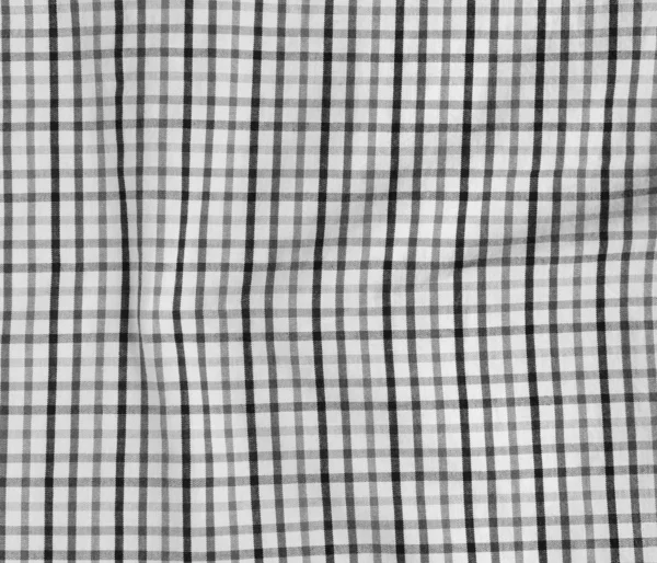 Texture of a black and white checkered picnic blanket. — Stock Photo, Image