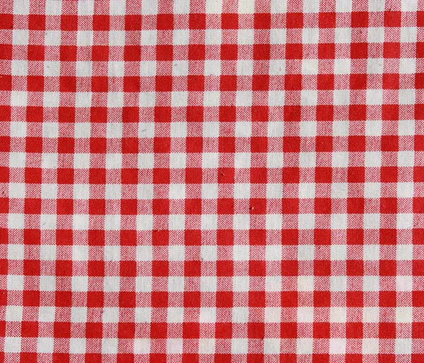 Red and white checkered picnic blanket. — Stock Photo, Image