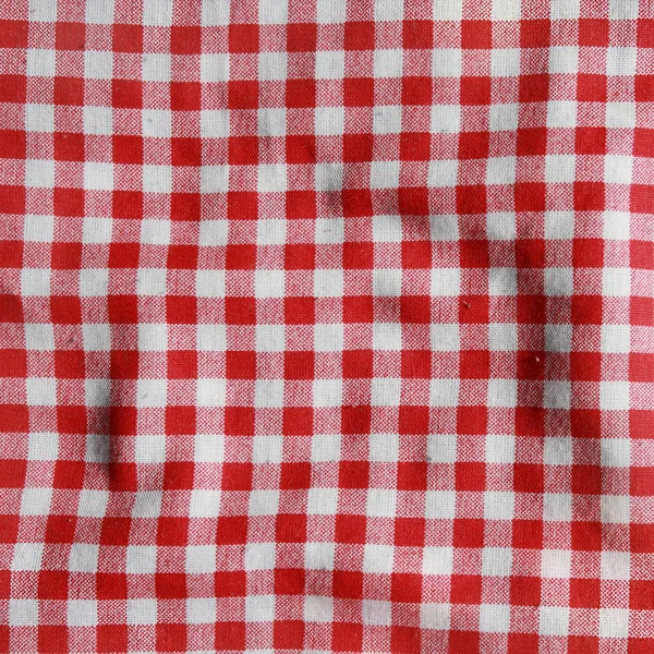 Textura de una manta de picnic a cuadros roja y blanca . — Foto de Stock