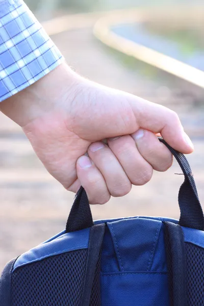 Backpack in a hand. — Stock Photo, Image