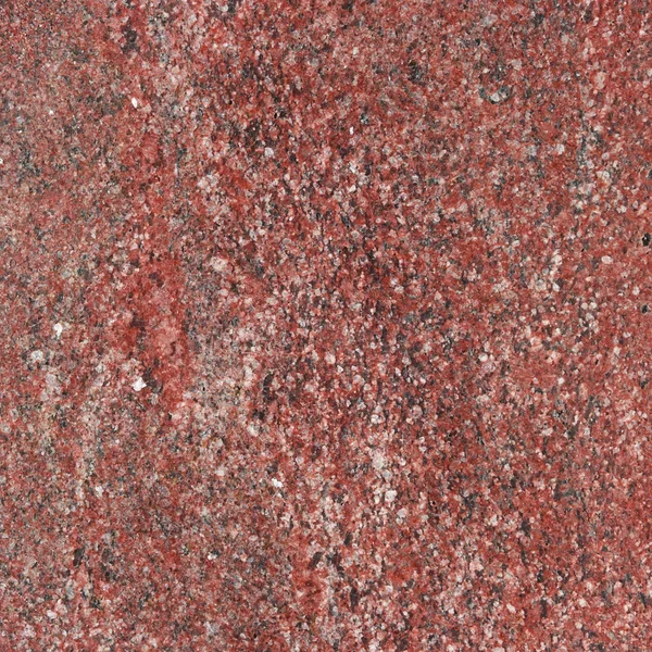 Doğal desenli kırmızı granit arka plan. — Stok fotoğraf