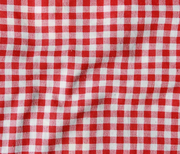 Textura de um cobertor de piquenique quadriculado vermelho e branco . — Fotografia de Stock