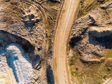 Dump road on a sand pit, aerial view