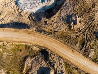 Dump road on a sand pit, aerial view