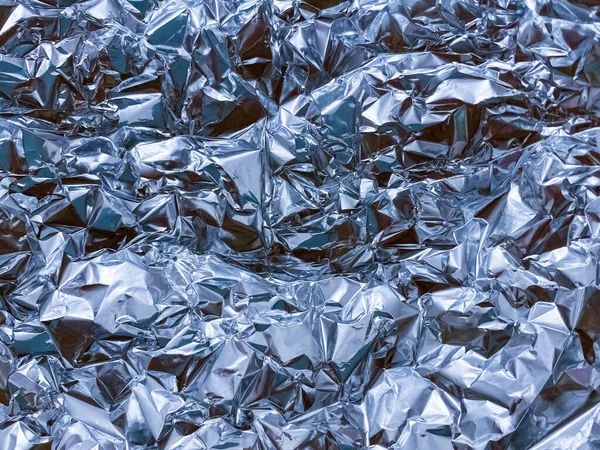 Zgnieciona Niebieska Struktura Folii Błyszczące Tło Świąteczne Papier Metalizowany — Zdjęcie stockowe