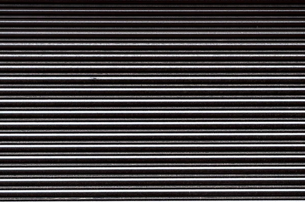 Черные стальные рольставни — стоковое фото