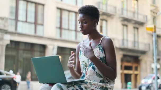 Woman Having Video Conference Her Laptop While Sitting Outdoors Street — Wideo stockowe