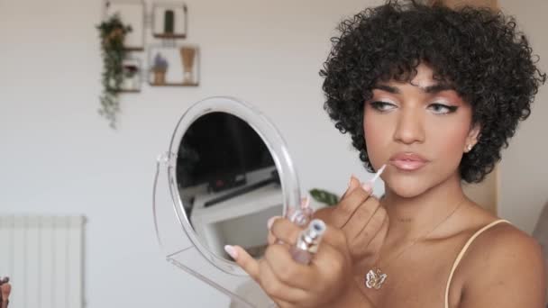 Close Video Transgender Woman Applying Lip Gloss While Doing Makeup — Stock Video