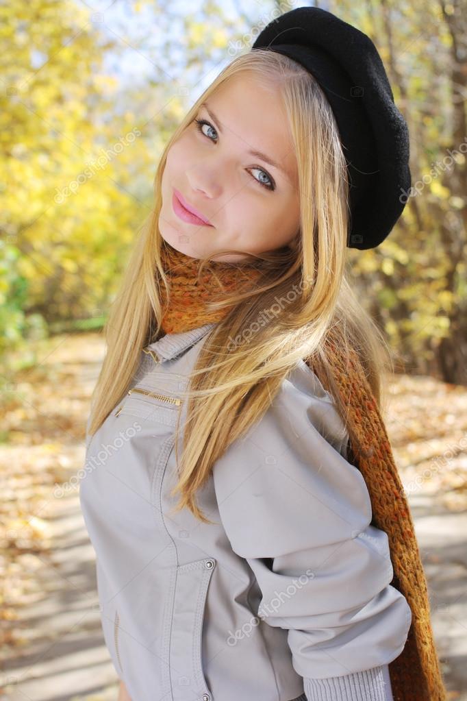 Young Blond Teen Girl Standing In A Park Stock Photo C Visoook