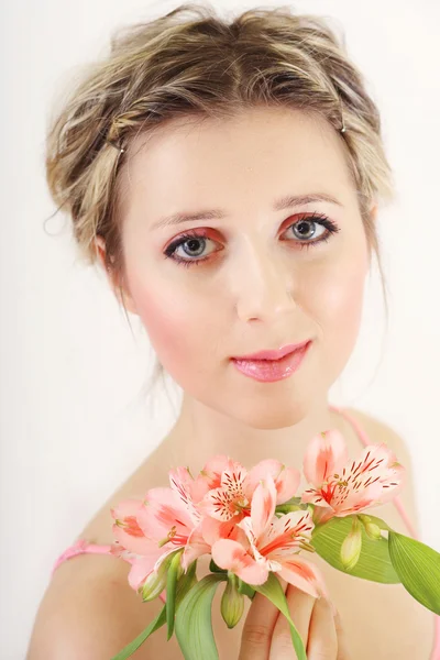 Pretty portrait young fresh blonde girl with flowers .studio — Stock Photo, Image